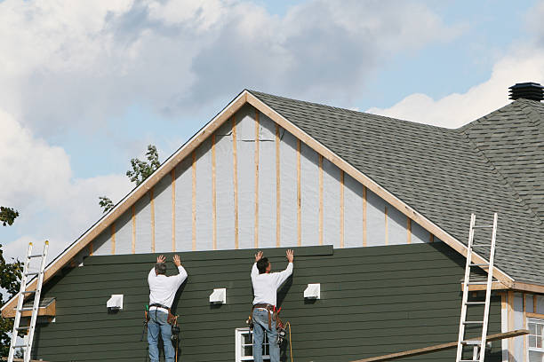 Professional Storm Damage Siding Repair technician working in Stedman, NC